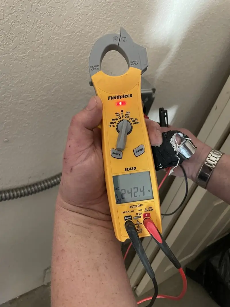 Voltage testing with clamp meter during Generator Installation in Port Charlotte